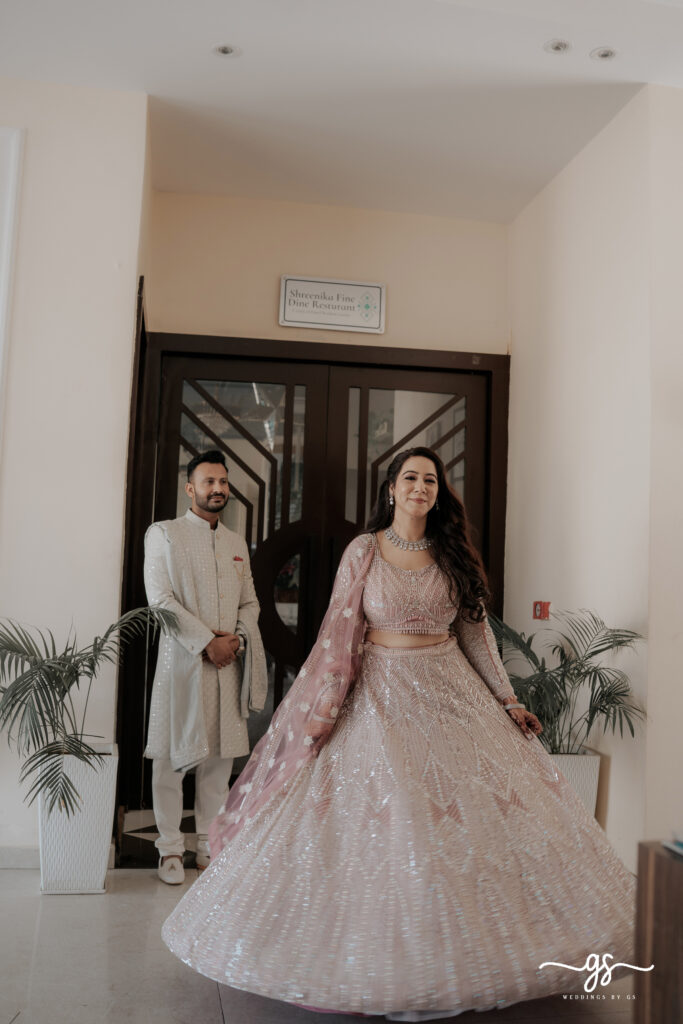 Neeraj and Prinka pose during their romantic indoor engagement session at a venue in Jammu, captured by Weddings by GS